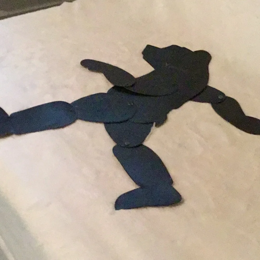 Jointed metal bear